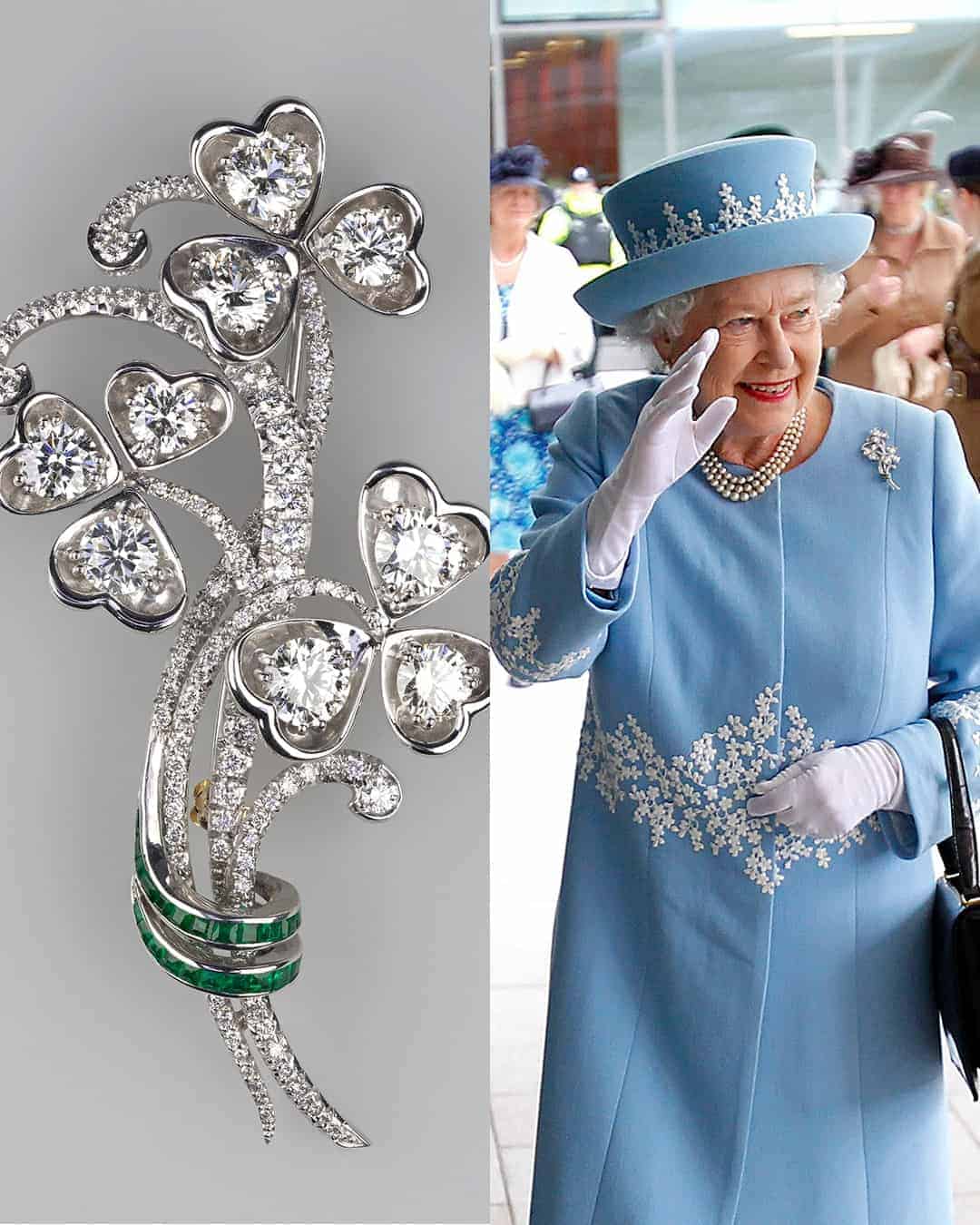 Queen Elizabeth in blue and brooch